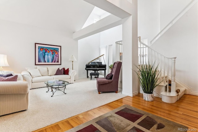 9411 E Hidden Hill Ln, Lone Tree, CO 80124 - living room with stairway, wood finished floors, and high vaulted ceiling