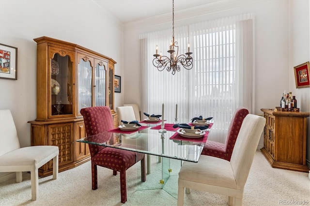 9411 E Hidden Hill Ln, Lone Tree, CO 80124 - dining area featuring light colored carpet, a chandelier, healthy amount of natural light, and ornamental molding