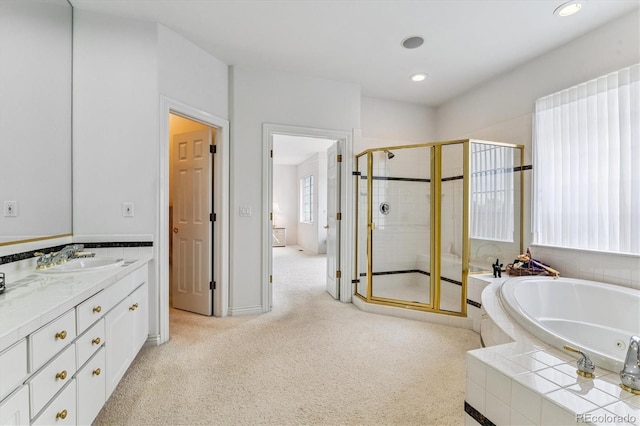 9411 E Hidden Hill Ln, Lone Tree, CO 80124 - full bath with a stall shower, vanity, a garden tub, and recessed lighting