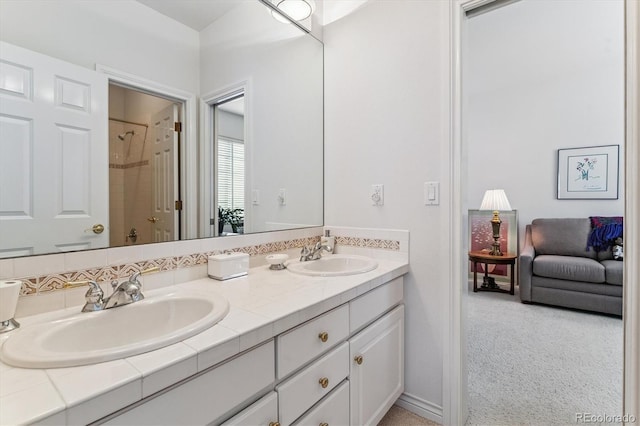 9411 E Hidden Hill Ln, Lone Tree, CO 80124 - full bathroom featuring double vanity and a shower
