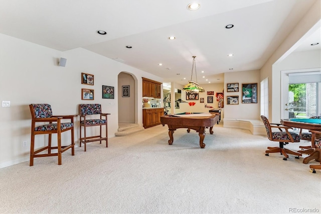 9411 E Hidden Hill Ln, Lone Tree, CO 80124 - game room with billiards, light colored carpet, arched walkways, and recessed lighting