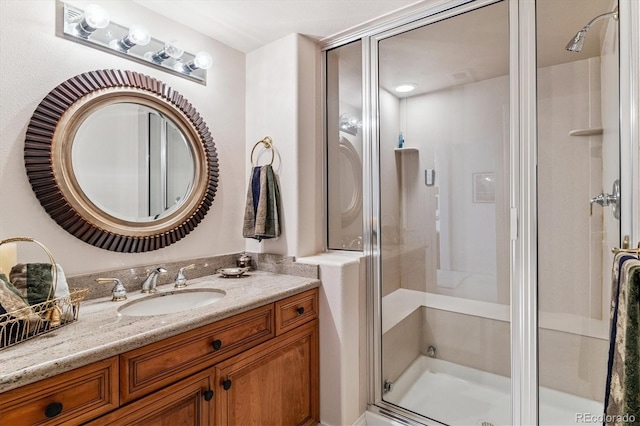 9411 E Hidden Hill Ln, Lone Tree, CO 80124 - bathroom featuring a stall shower and vanity