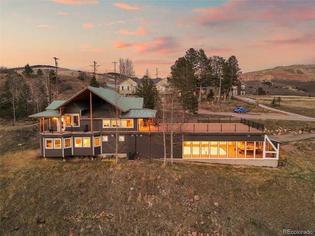 137 Hayden St, Cripple Creek, CO 80813 - back of house at dusk with metal roof