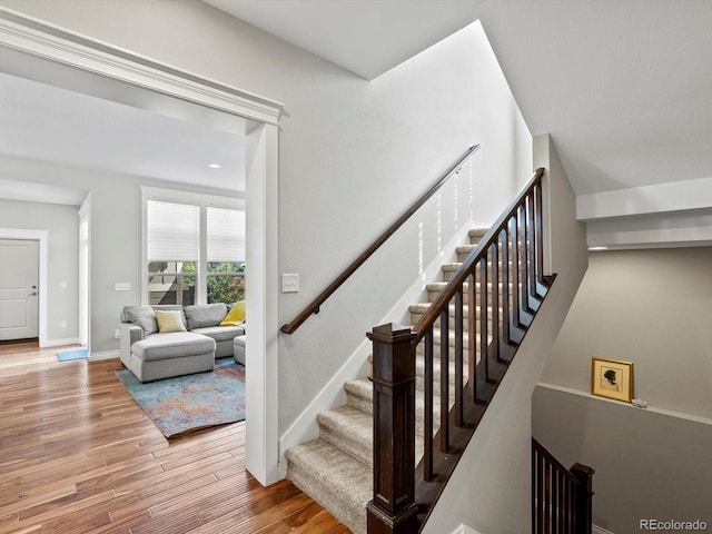 8012 E 50th Dr, Denver, CO 80238 - stairs featuring wood finished floors and baseboards