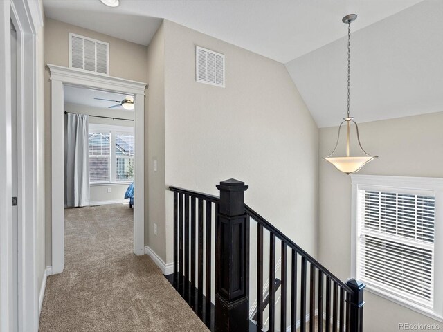8012 E 50th Dr, Denver, CO 80238 - hall with an upstairs landing, carpet floors, and vaulted ceiling