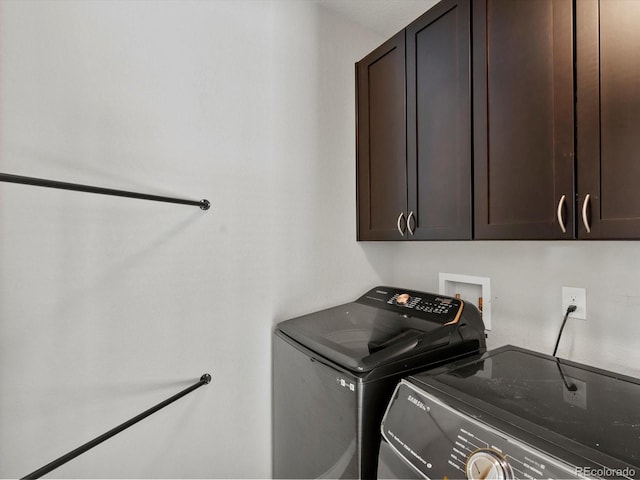 8012 E 50th Dr, Denver, CO 80238 - laundry area with cabinet space and independent washer and dryer