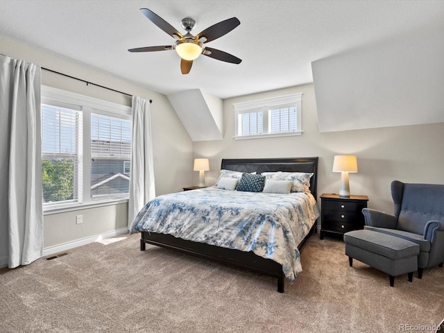 8012 E 50th Dr, Denver, CO 80238 - bedroom featuring carpet floors, multiple windows, and ceiling fan