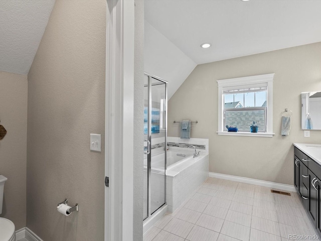 8012 E 50th Dr, Denver, CO 80238 - bathroom with vanity, a bath, a stall shower, vaulted ceiling, and tile patterned flooring