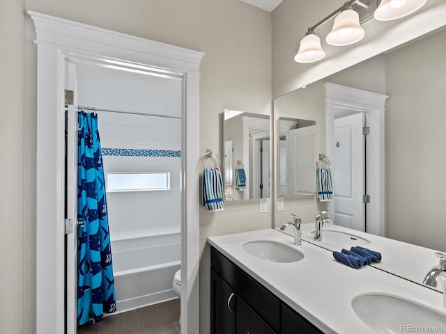 8012 E 50th Dr, Denver, CO 80238 - bathroom featuring double vanity and shower / tub combo with curtain