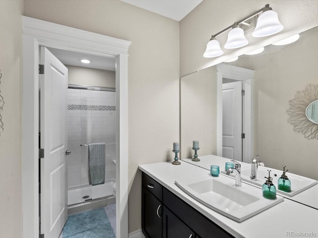 8012 E 50th Dr, Denver, CO 80238 - full bath with vanity, a shower stall, and tile patterned floors