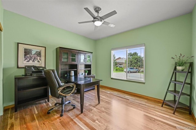 6475 Umber Cir, Arvada, CO 80007 - home office with wood finished floors and a ceiling fan