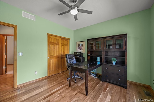 6475 Umber Cir, Arvada, CO 80007 - home office with ceiling fan and light wood-type flooring
