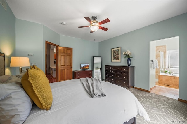 6475 Umber Cir, Arvada, CO 80007 - carpeted bedroom with connected bathroom and a ceiling fan
