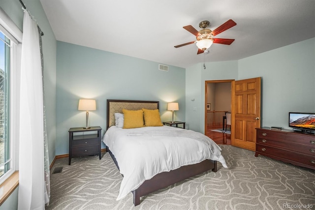 6475 Umber Cir, Arvada, CO 80007 - carpeted bedroom featuring baseboards and a ceiling fan