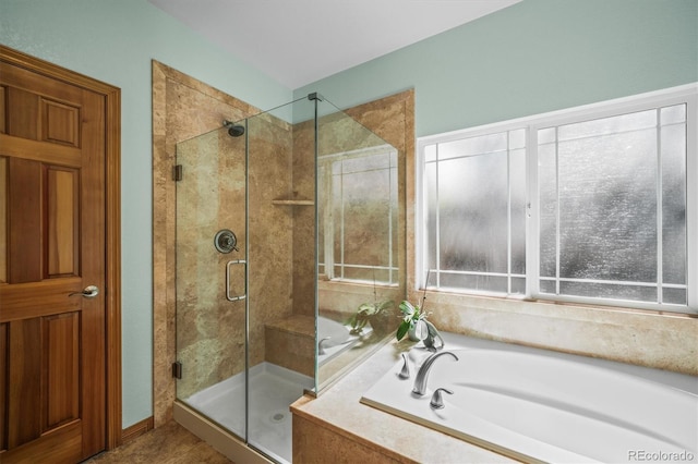6475 Umber Cir, Arvada, CO 80007 - bathroom featuring a bath and a stall shower