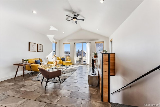 interior space with vaulted ceiling and ceiling fan