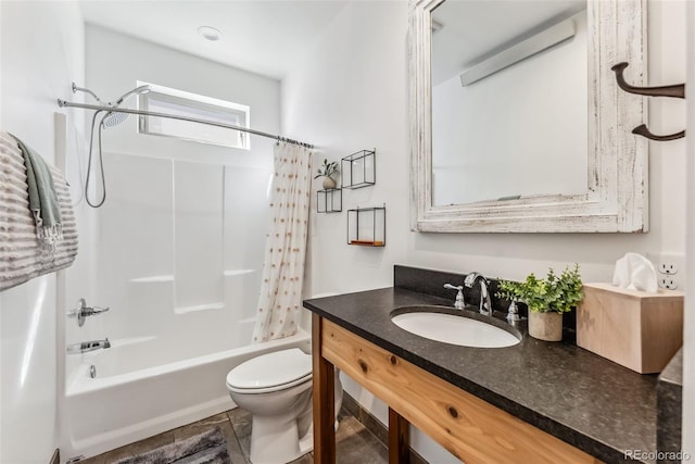 full bathroom featuring tile patterned flooring, vanity, toilet, and shower / bath combo with shower curtain