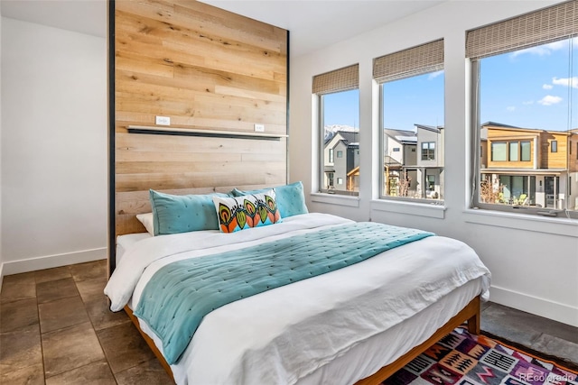 bedroom featuring dark tile patterned flooring