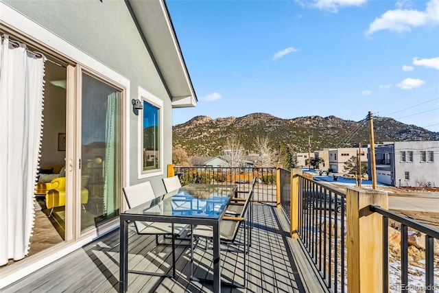 balcony featuring a mountain view