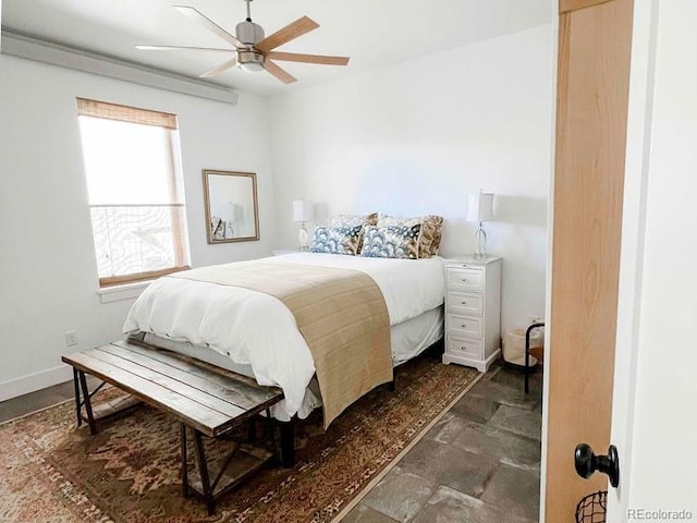 bedroom featuring ceiling fan