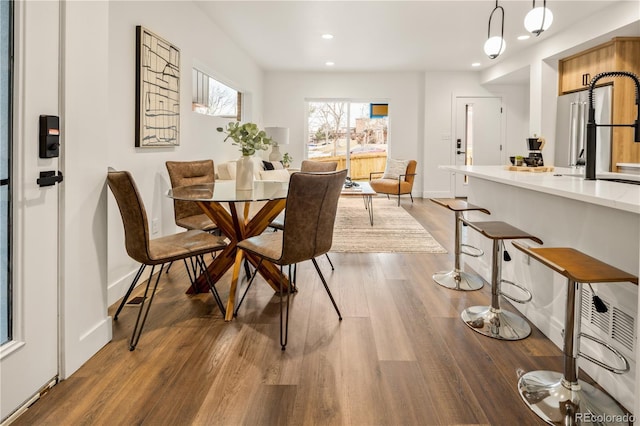 1344 N Knox Ct, Denver, CO 80204 - dining room featuring wood finished floors and recessed lighting