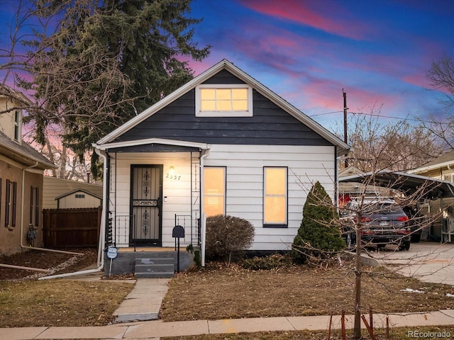 bungalow-style house with a carport