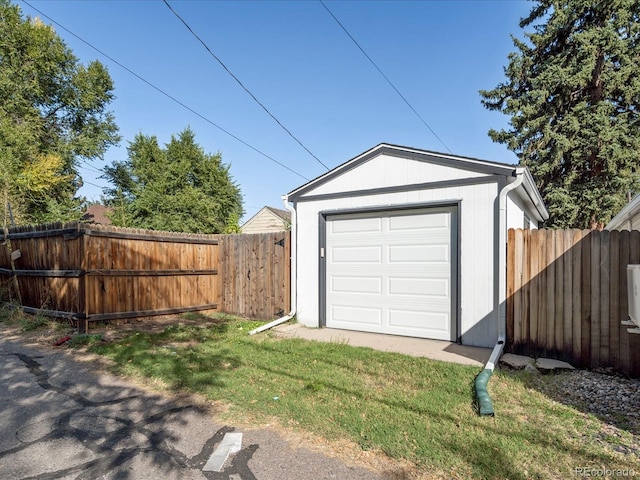 garage with a lawn