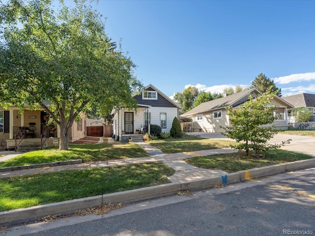 view of front of home featuring a front lawn