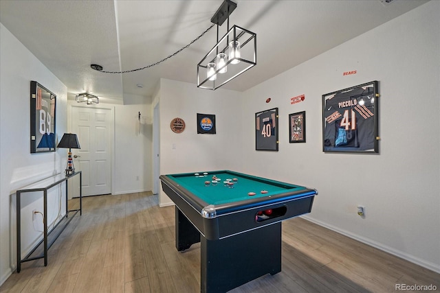rec room with wood finished floors, baseboards, and billiards