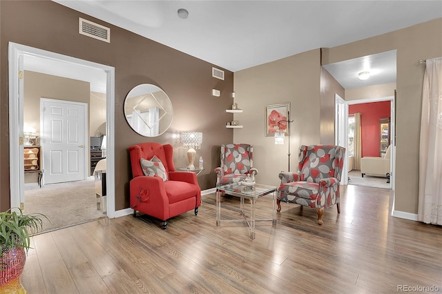 sitting room featuring hardwood / wood-style flooring