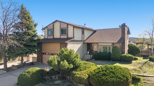 5245 Sapphire Dr, Colorado Springs, CO 80918 - tudor house featuring stucco siding, a chimney, and an attached garage