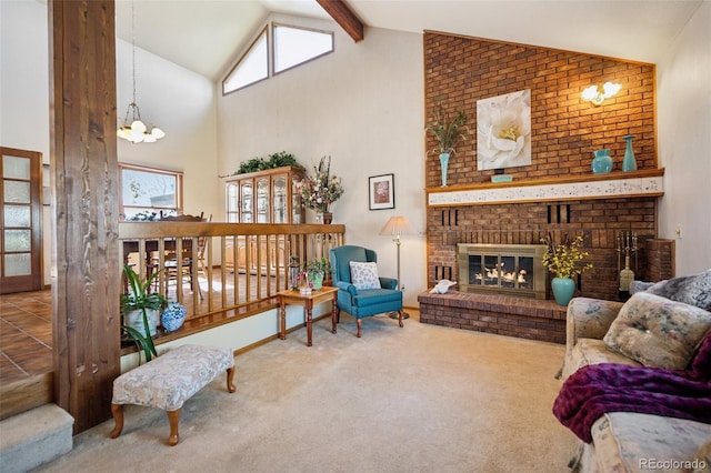 5245 Sapphire Dr, Colorado Springs, CO 80918 - carpeted living area featuring a chandelier, high vaulted ceiling, plenty of natural light, a brick fireplace, and beam ceiling