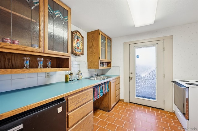5245 Sapphire Dr, Colorado Springs, CO 80918 - kitchen featuring electric stove, a sink, light tile patterned floors, glass insert cabinets, and light countertops
