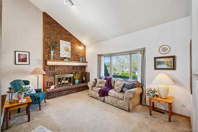 5245 Sapphire Dr, Colorado Springs, CO 80918 - carpeted living area featuring a fireplace and high vaulted ceiling