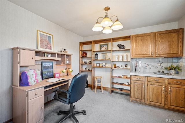 5245 Sapphire Dr, Colorado Springs, CO 80918 - office space with a sink, light carpet, and a chandelier