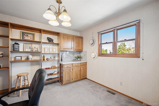 5245 Sapphire Dr, Colorado Springs, CO 80918 - office featuring a chandelier, light colored carpet, and baseboards