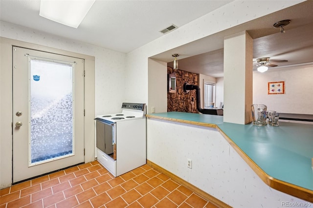 5245 Sapphire Dr, Colorado Springs, CO 80918 - laundry area featuring tile patterned flooring and a ceiling fan