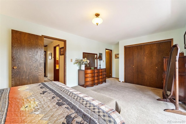 bedroom featuring a closet and carpet flooring