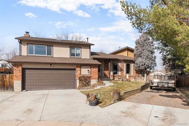7551 S Garland St, Littleton, CO 80128 - tri-level home featuring an attached garage, driveway, brick siding, a chimney, and a shingled roof