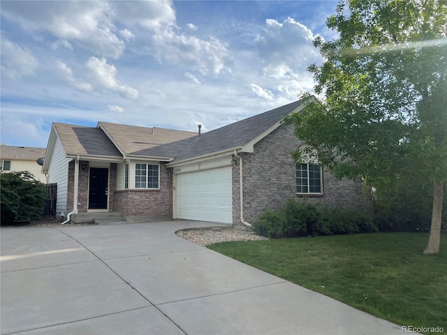 18784 E Linvale Pl, Aurora, CO 80013 - ranch-style house featuring concrete driveway, brick siding, a garage, a front lawn, and a shingled roof