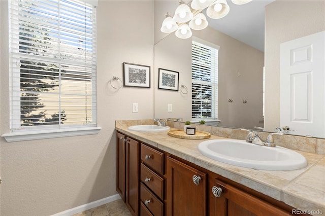 16179 E Geddes Ln Unit 96, Aurora, CO 80016 - bathroom with double vanity, tile patterned flooring, and a chandelier