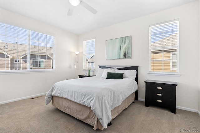 16179 E Geddes Ln Unit 96, Aurora, CO 80016 - bedroom with light carpet and a ceiling fan