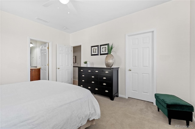 16179 E Geddes Ln Unit 96, Aurora, CO 80016 - bedroom with carpet flooring, ensuite bath, and a ceiling fan