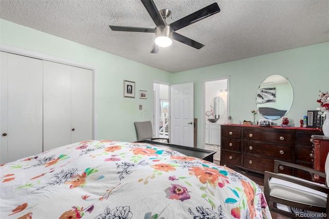 bedroom with a closet, wood finished floors, a textured ceiling, and ceiling fan