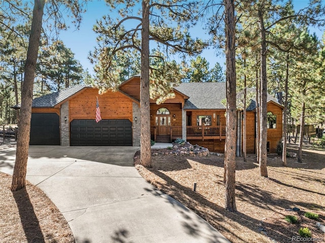 view of front facade featuring a garage and a porch