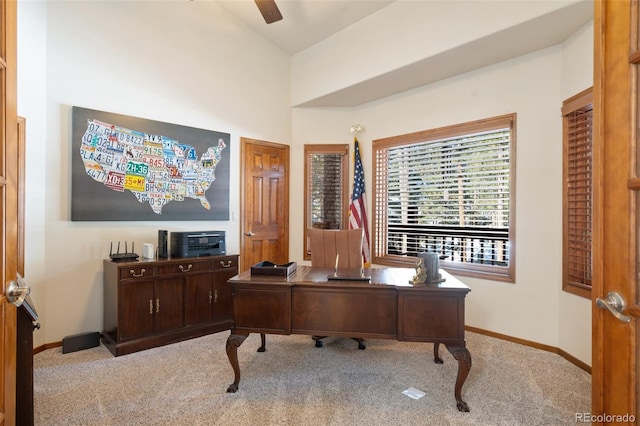 office featuring ceiling fan and light colored carpet