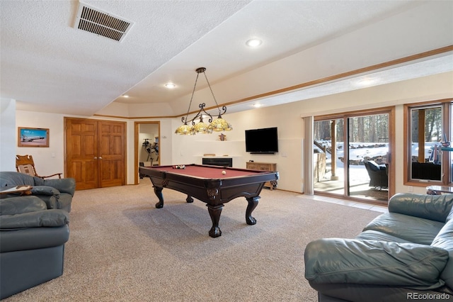 playroom featuring light carpet, billiards, and a textured ceiling