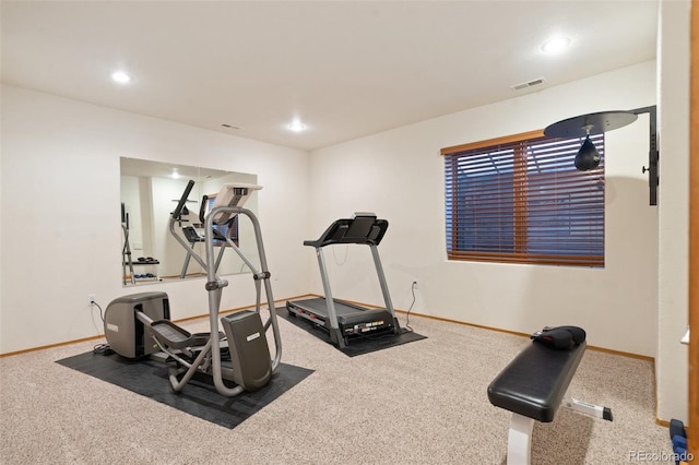 workout area featuring carpet