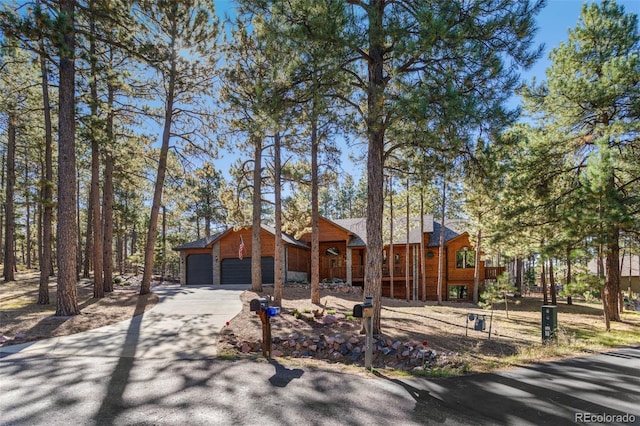 view of front of property with a garage