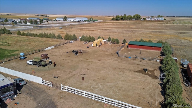 birds eye view of property featuring a rural view